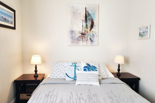 Cozy up in this Queen bed on the main floor.