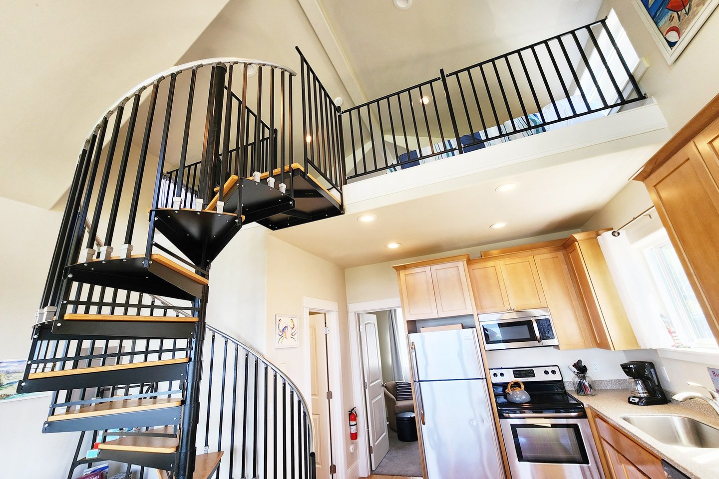 Spiral staircase takes you to the loft.