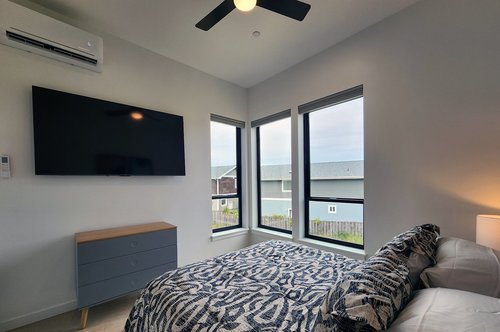 Second floor bedroom #4 with comfy queen bed.