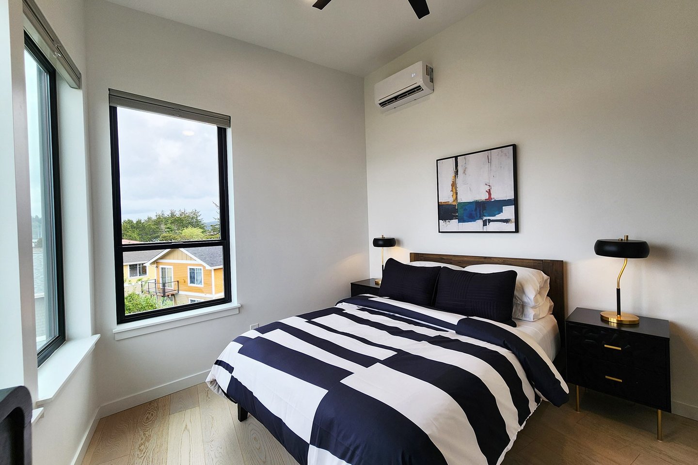 Third floor bedroom #3 with comfy queen bed.