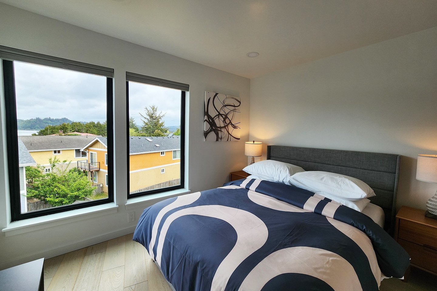 Bright and sunny third floor bedroom with queen bed.