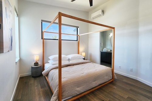 The primary bedroom on the third floor has an ensuite bath.