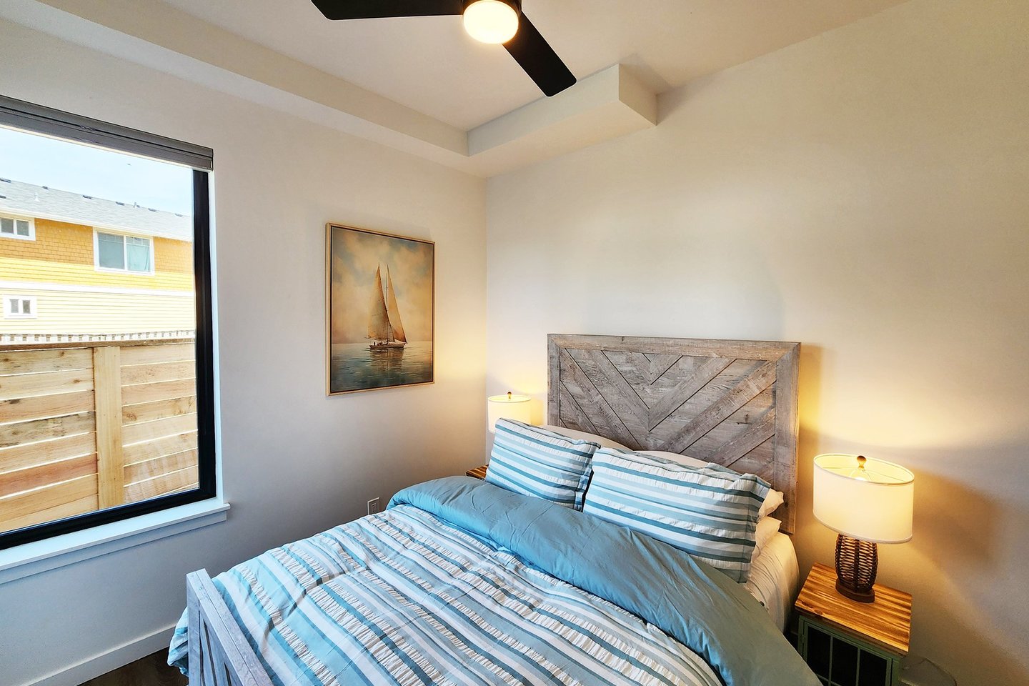 Fourth bedroom in on the entry level tucked behind the game room/garage.