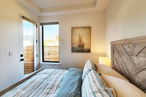 Queen bed to enjoy plus ensuite bath and access to the hot tub,