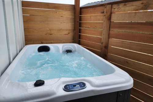 Two person hot tub~enjoy the bubbles after a day of exploring.