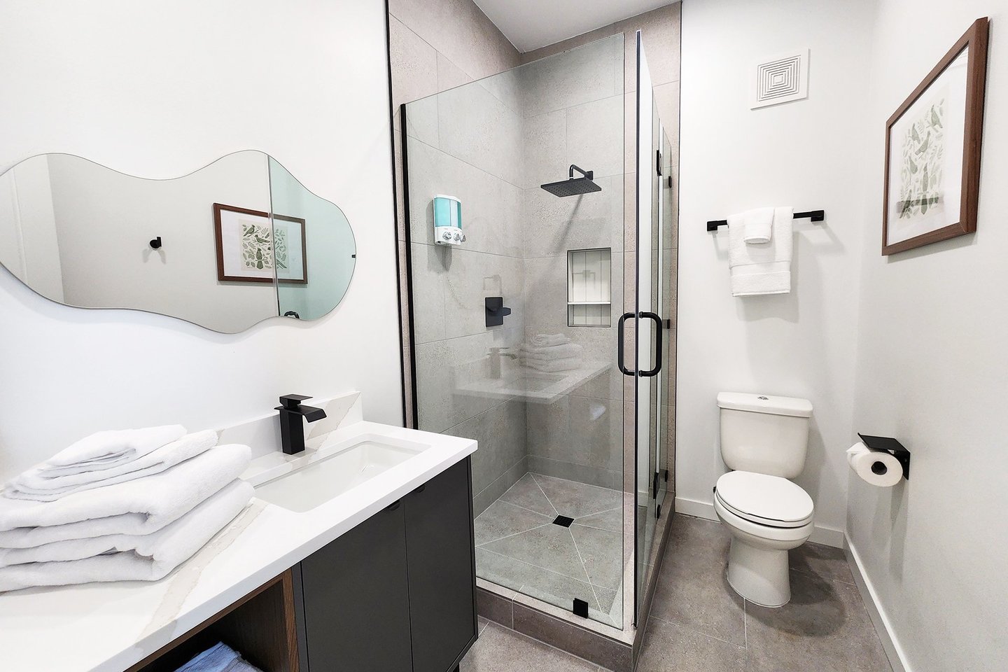 Entry level bedroom has an ensuite bath.