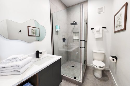 Entry level bedroom has an ensuite bath.