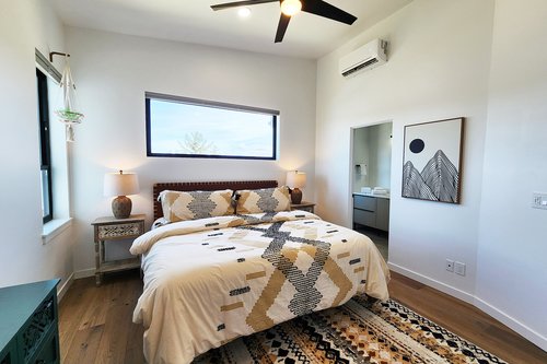 Primary bedroom on third floor with ensuite bath.