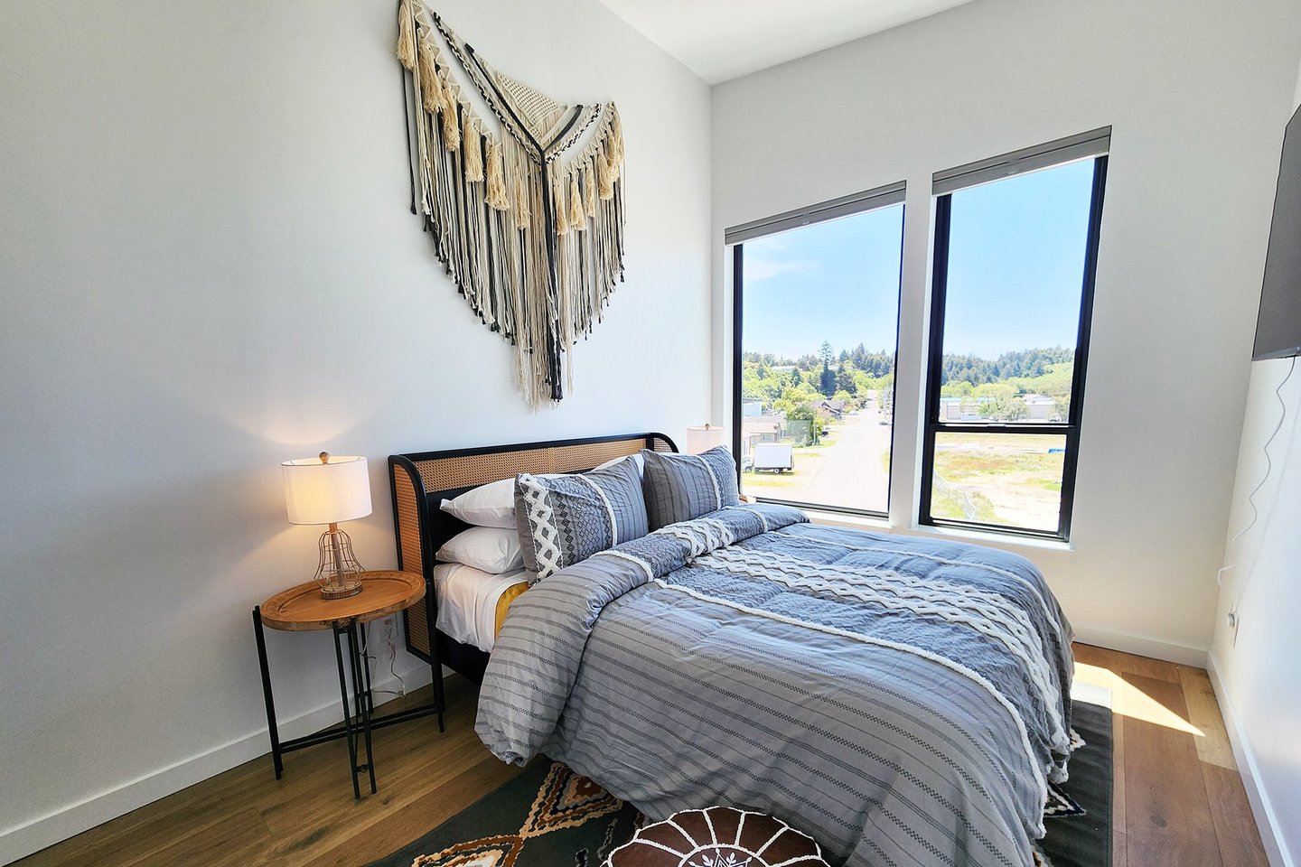 Second bedroom on the third floor with queen bed.
