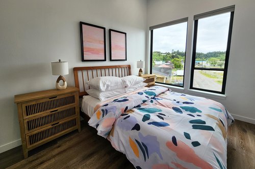 Second bedroom on the third floor with a comfy queen bed,