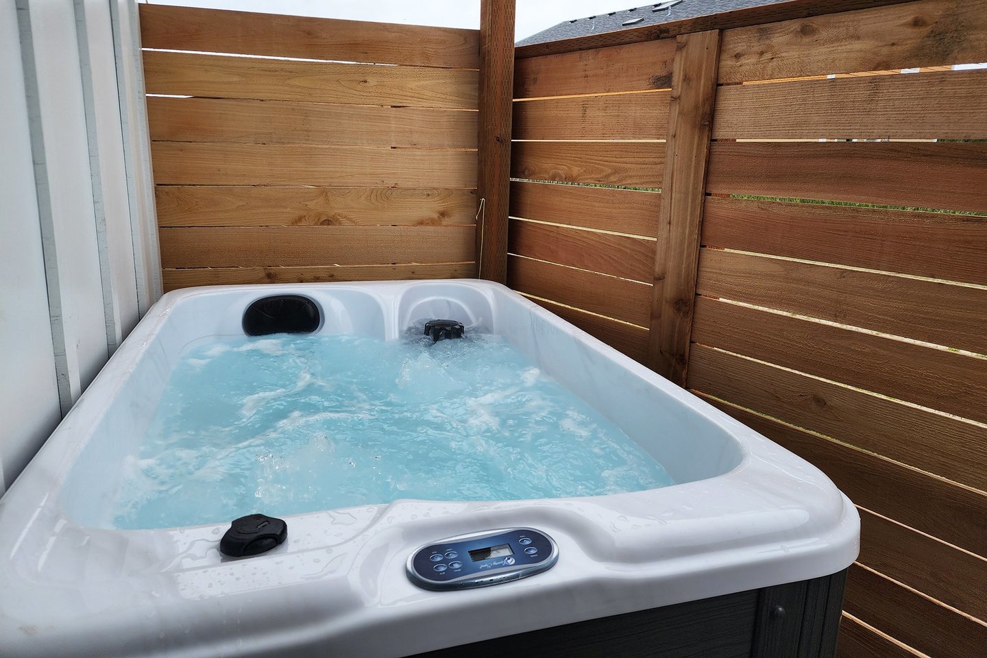 Two person hot tub is the perfect end to a wonderful coastal day.
