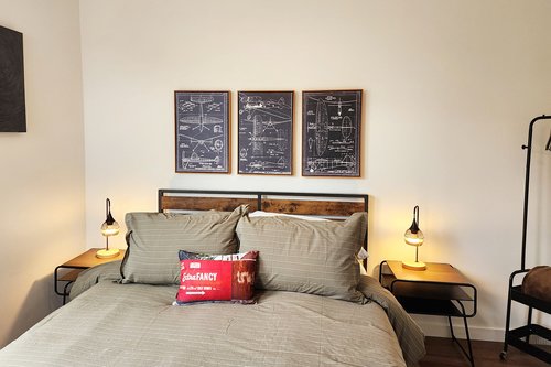 Cozy bedroom #4 with queen bed on main level with ensuite bath.