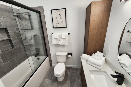 Full bath to share on the third floor.