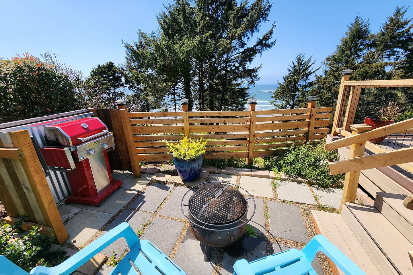 A small fire pit and a gas grill for your enjoyment.