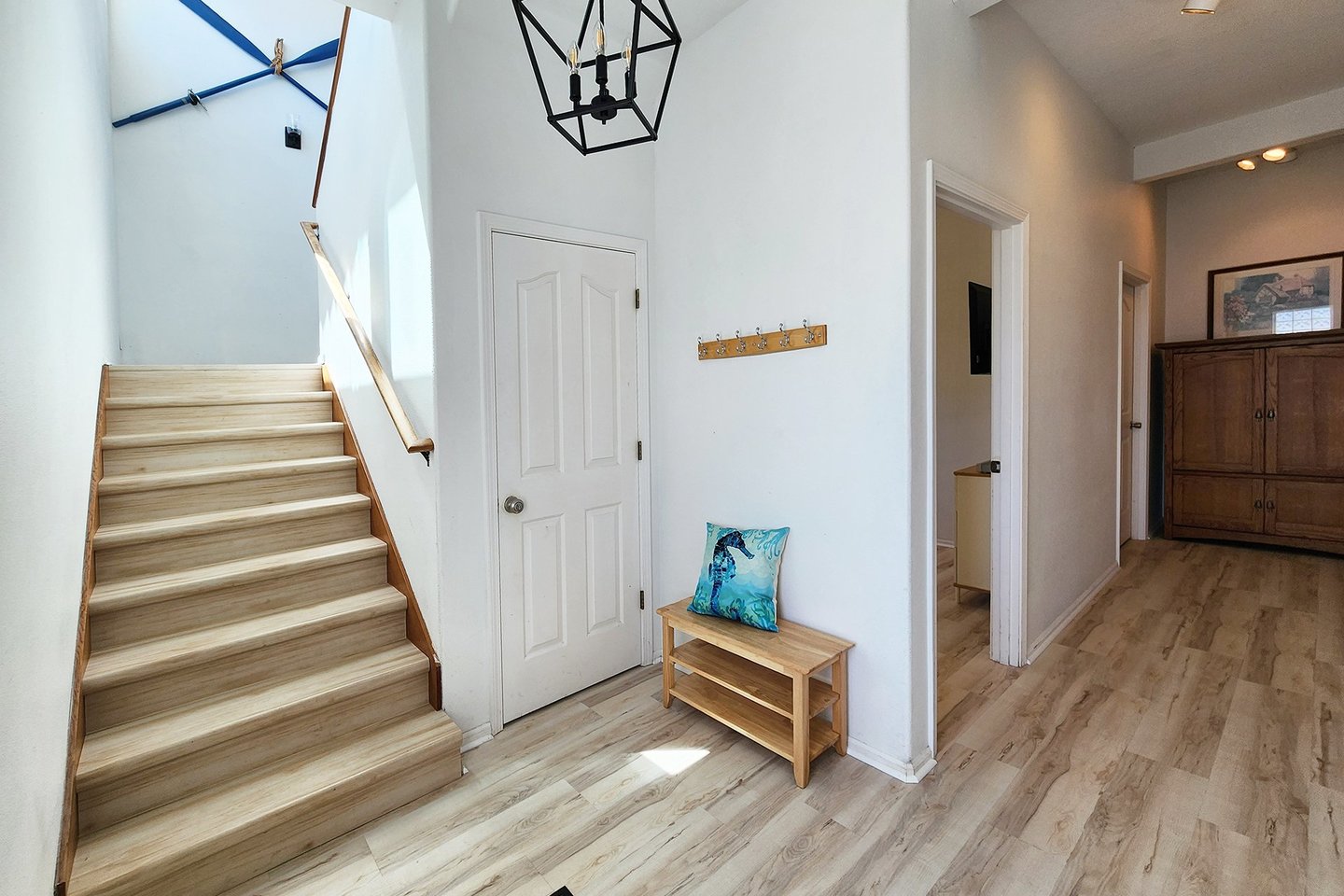 Entry level with bedroom in the hall.