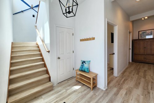 Entry level with bedroom in the hall.