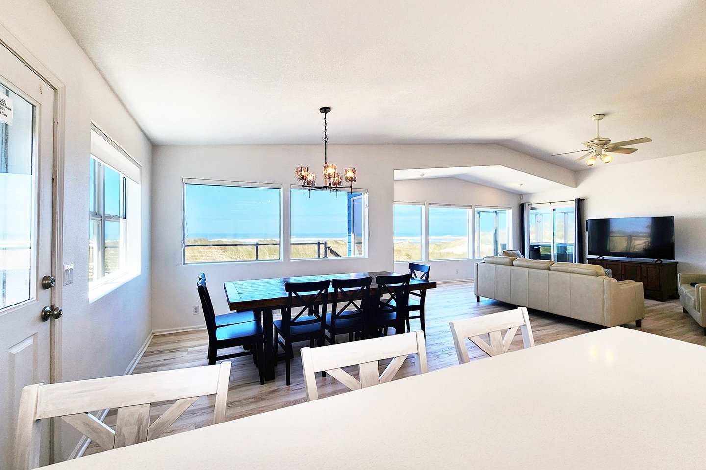 Kitchen counter seating as well as a large dining table.