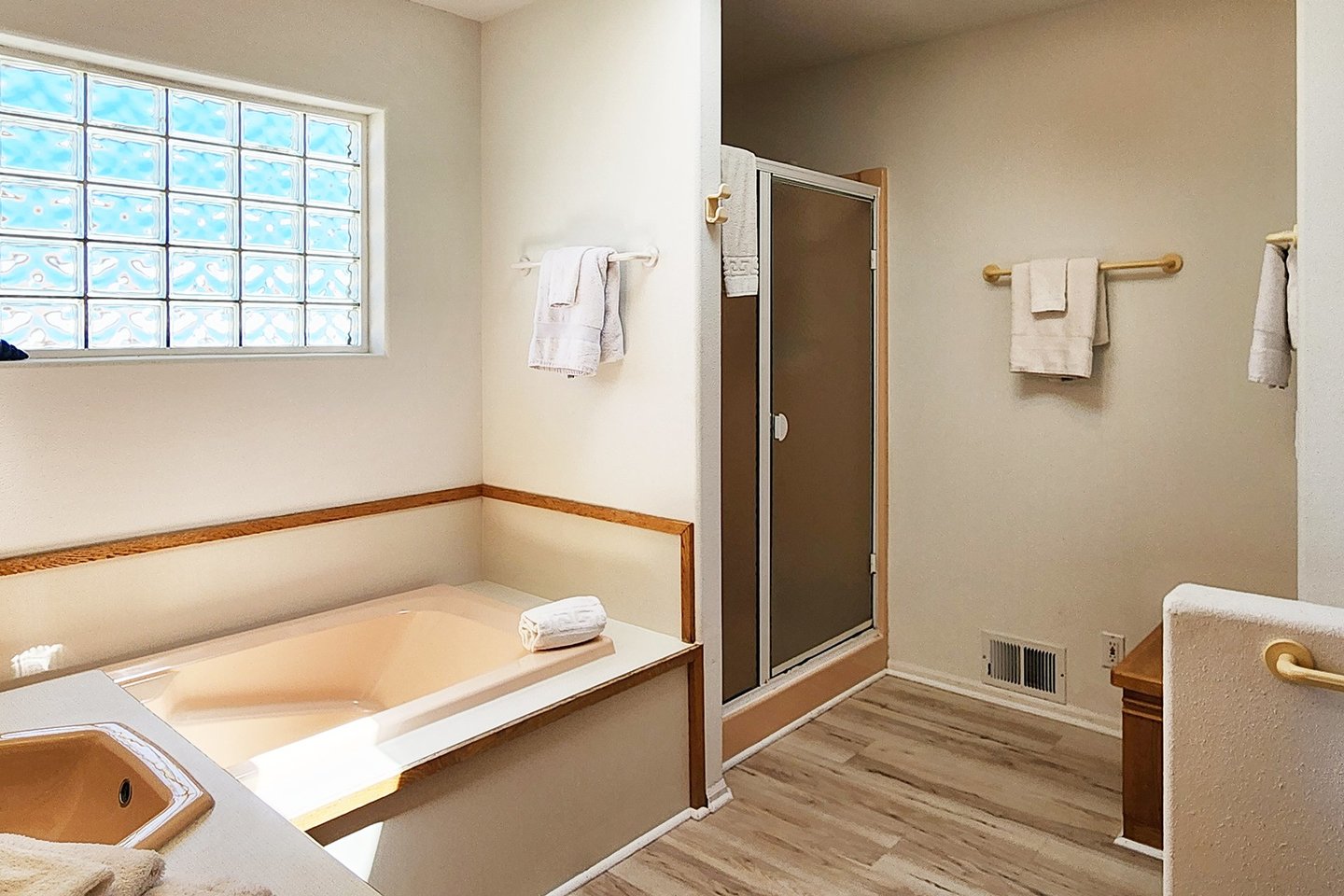 Primary ensuite with shower and tub.