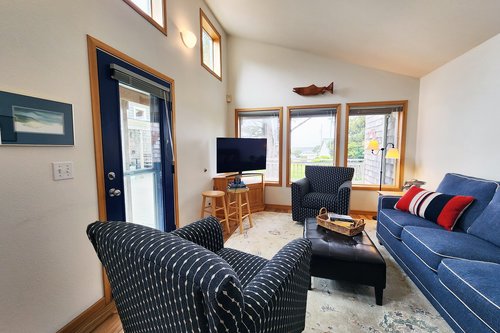Enjoy all of the light and comfy seating in the living room.