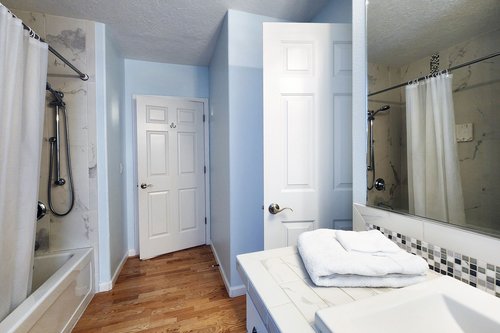 Second bath with tub/shower combo.