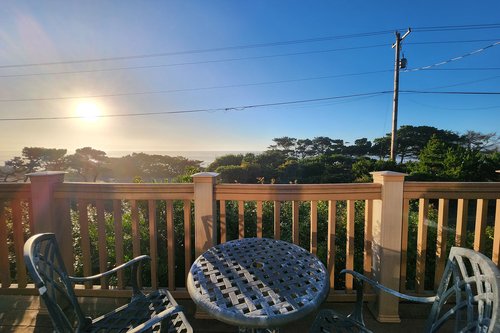 Sit out on the deck and watch the sun set into the Pacific.
