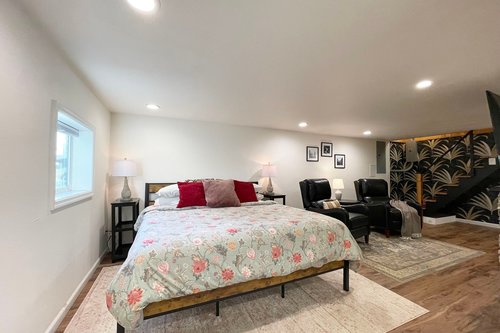 King bed with sitting area.
