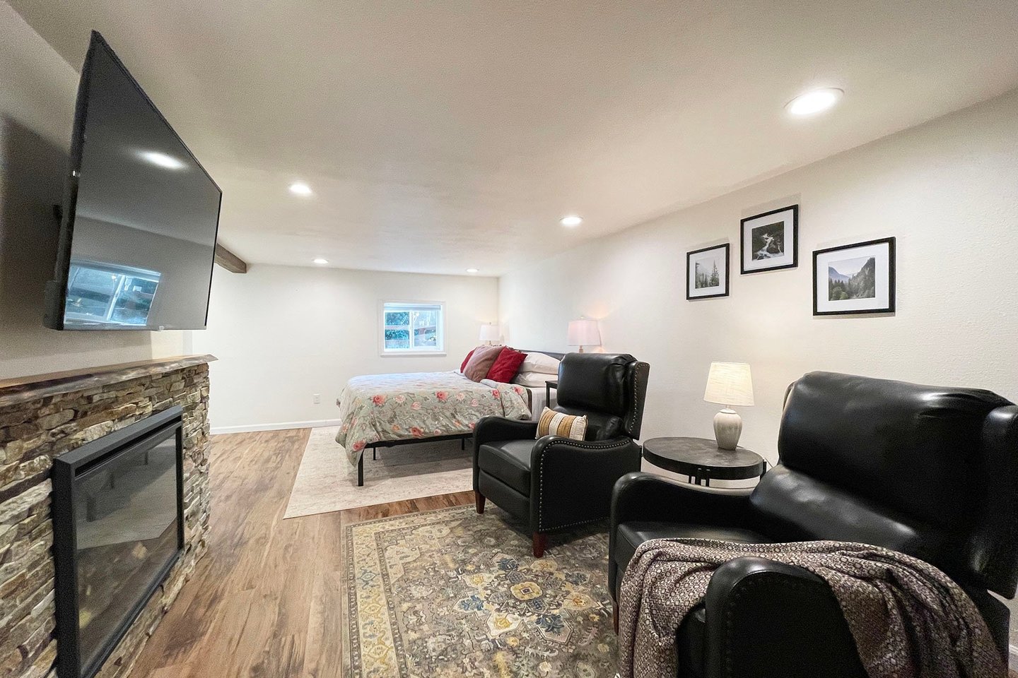 Downstairs is an entire bedroom suite with TV and electric fireplace.