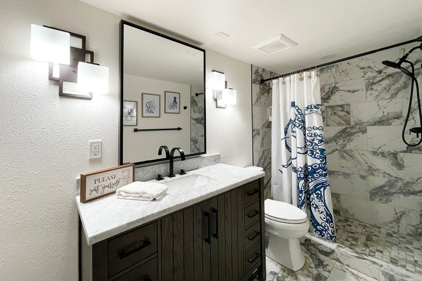 The downstairs suite has its own bath with walk in shower.