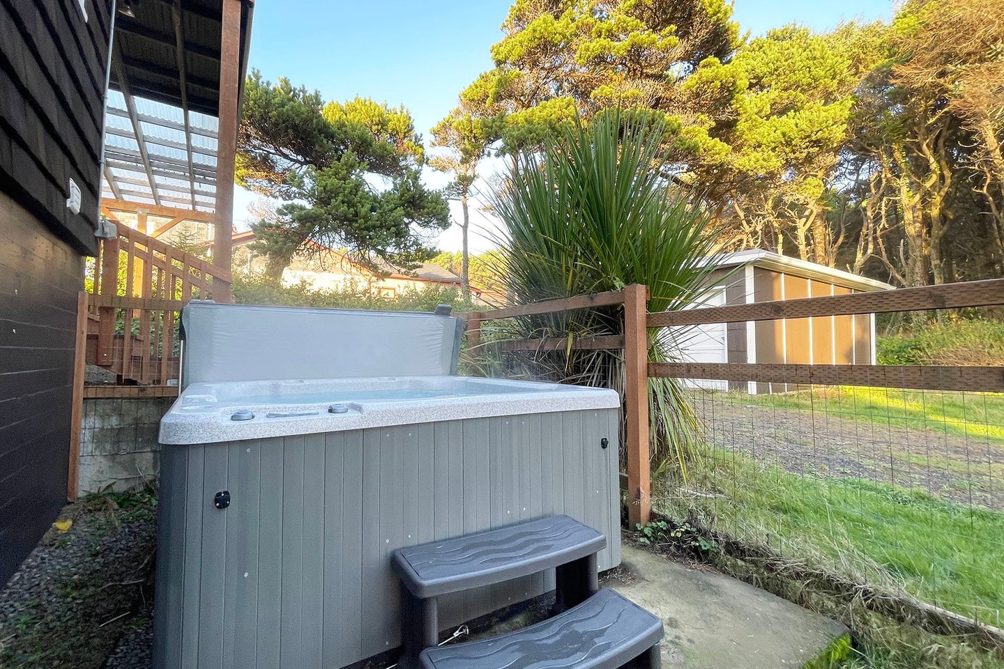 Private hot tub off of the downstairs suite.