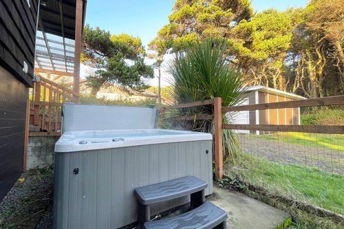 Private hot tub off of the downstairs suite.