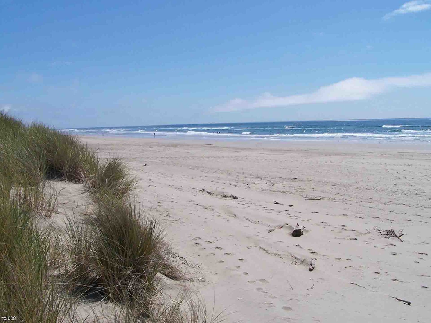 Short walk to miles of sandy beach!