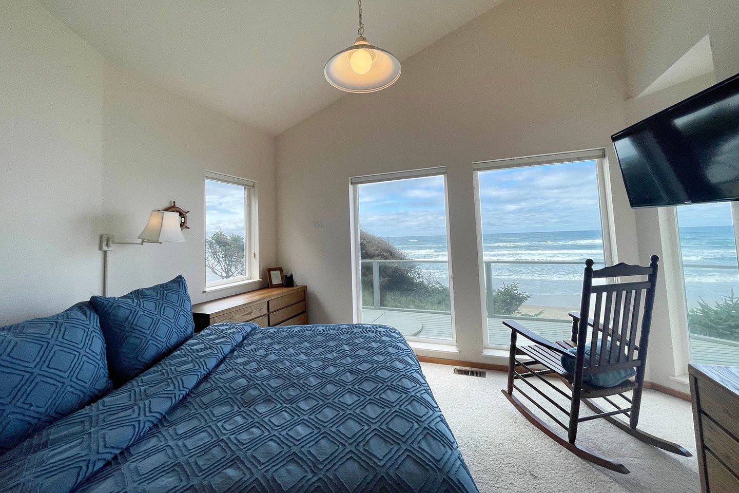 The Primary suite has beautiful ocean views and comfy queen bed.