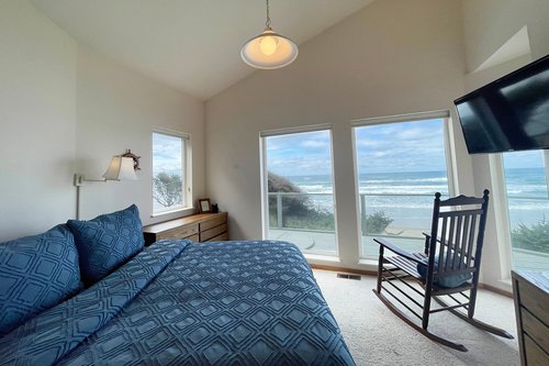 The Primary suite has beautiful ocean views and comfy queen bed.