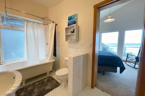 The ensuite has a wonderful footed tub/shower.